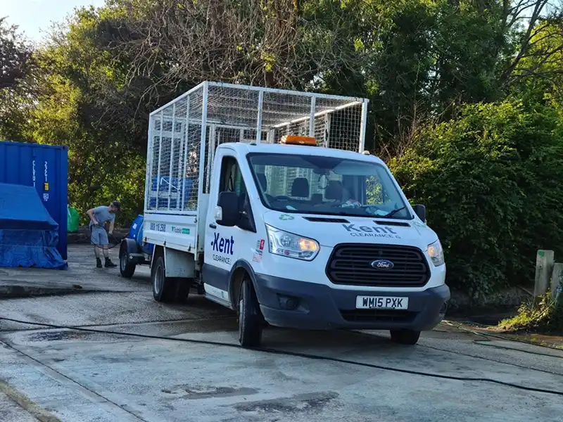 Truck with recycling cage on back